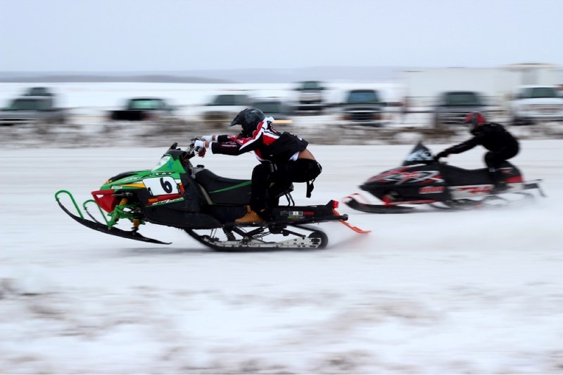 Rider Conan Jainvier speeds away from the competition at the Saskatchewan Snowmobile Riders Association Choko Pro Racing Series drag racing event near St. Paul last weekend.