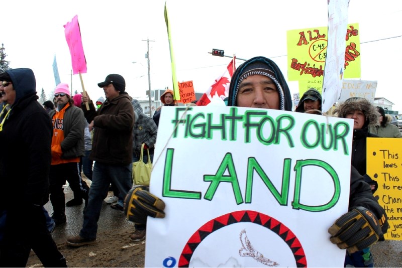 A large group of people from surrounding areas took to Main Street in St. Paul toting signs and belting out chants in support of the Idle No More movement&#8217;s worldwide