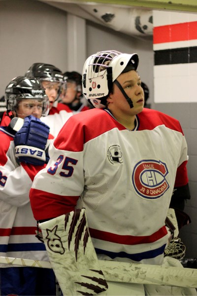 Austin Rediron leads the St. Paul Canadiens onto the ice during a game earlier this season. Rediron was awarded with the title of rookie of the year by the NEAJBHL.