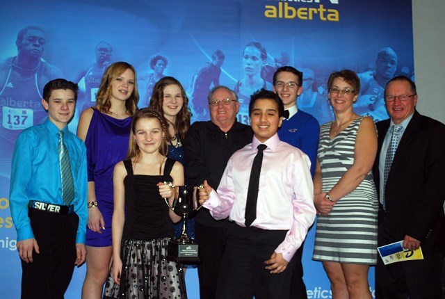 Members of the North East Alberta Track Club accept an award for best overall B club 2012 at the Athletics Alberta Awards Banquet on Feb. 9 in Edmonton