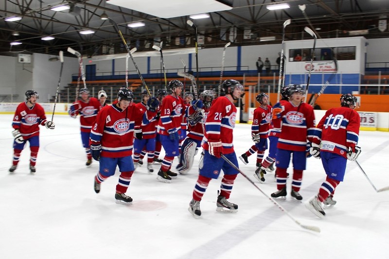 The St. Paul Canadiens raise their sticks in salute of the fans following Saturday&#8217;s 5-3 loss to the Cold Lake Ice that eliminated the Habs from the post season.