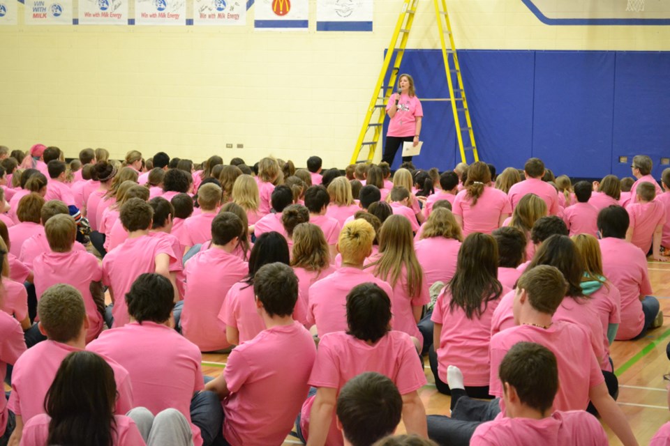 Ecole Mallaig School family and school liaison worker Olga Filipchuk speaks to students about bullying during Pink Shirt Day last week.