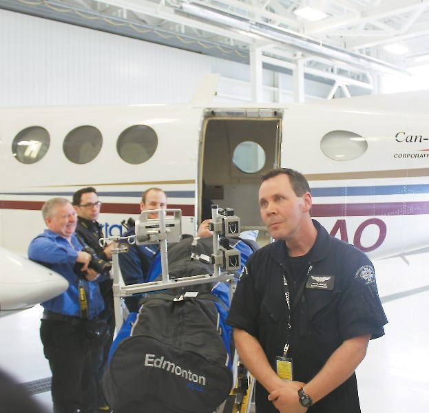 Emergency personnel offered politicians and media from northern Alberta communities a demonstration on how patients are transferred from an air ambulance to a ground