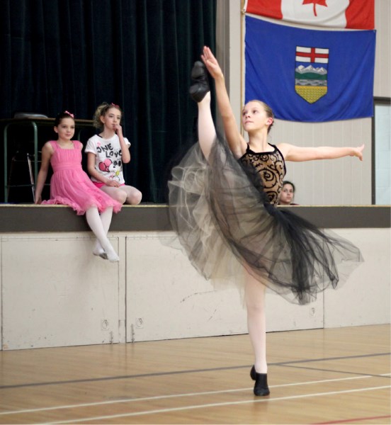 Morgan Gerlinsky dances for students at Racette School last Friday. The 11-year-old ballerina was recently accepted to a summer program at the Royal Winnipeg Ballet
