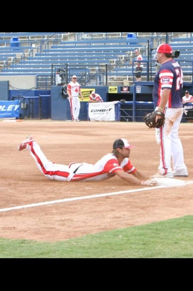 Shawn Germain slides head first into third base for a triple in thhe Border Battle between Team Canada and the USA national team last Thursday. USA won the game 25-10.