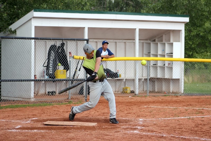 Jonathan Leskiw of Pitch Slap puts a ball into the outfield for an extra base hit during a game at the St. Paul Slo-Pitch League year-end tournament on Sunday afternoon.