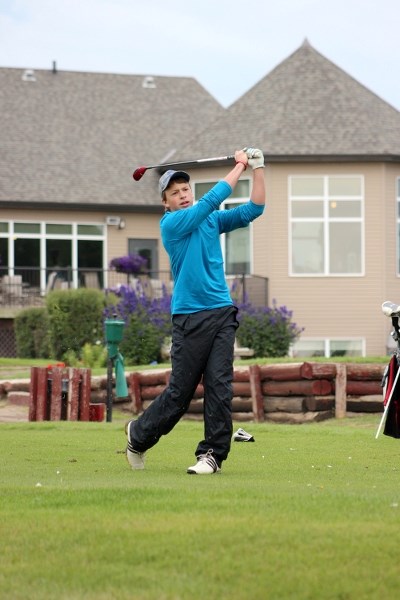 Jeremy Pasitney tees off from the first hole at Sunday&#8217;s St. Paul Golf Club Championship. Pasitney shot an 87 to claim the title of Junior Champion.