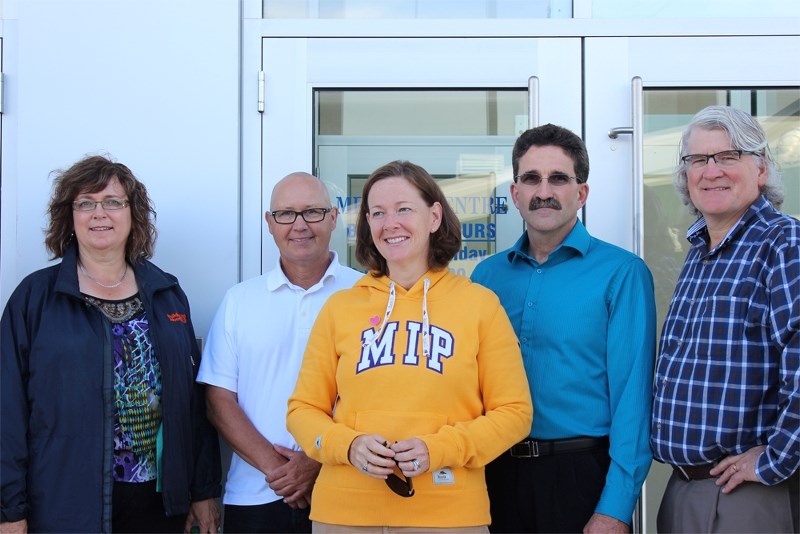 Calgary-Glenmore MLA Linda Johnson, Grande Prairie-Smoky MLA Everett McDonald, Premier Alison Redford and Edmonton-Gold Bar MLA David Dorward (right) visited Mayor Glenn