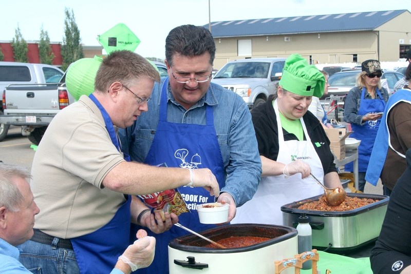 Members of St. Paul Town Council Danny White, and Norm Noel were in attendance and were on a team cooking at the Chili Cook-off on Aug. 29, at the Co-op Mall.