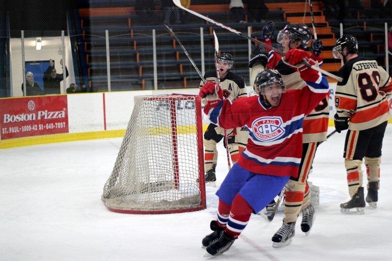 Skyler Giroux pots an overtime winner against the Wainwright Bisons last season.