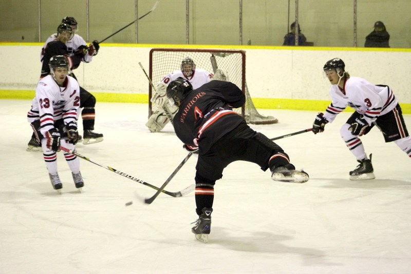 Saddle Lake Warriors&#8217; defenceman Buddy Morin fires a shot on goal in Saddle Lake&#8217;s 7-4 loss to the Lloydminster Bandits at Manitou Kihew Arena on Friday night.