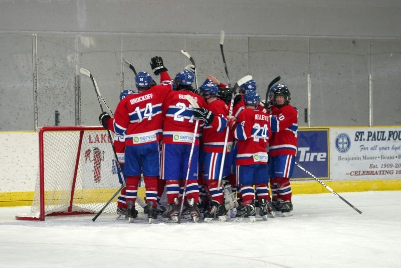 The St. Paul Canadiens celebrate becoming only the second team in the league to defeat the Lloydminster Bandits, after a successful 2-1 contest at the Clancy Richard Arena on 