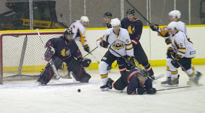 The Saddle Lake Warriors labour against an offensive play by the Vermilion Tigers, during their game on Jan. 12 at the Kihew Manitou Arena. Saddle Lake&#8217;s defensive