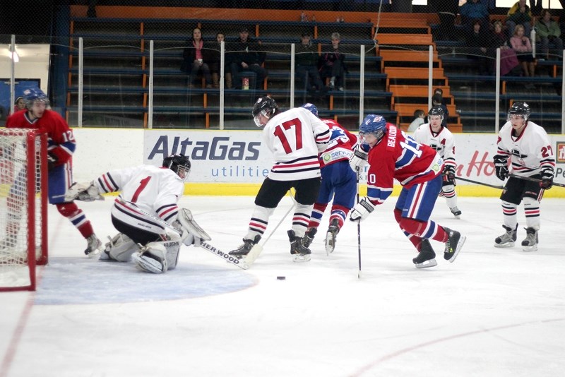 Pierre Beaudoin jumps on a loose puck and deposits it into the back of the net for the St. Paul Canadiens&#8217; second goal in their 9-3 loss to the Lloydminster Bandits at