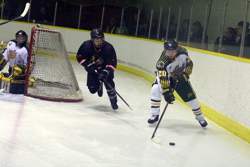 Preston Sparklingeyes with the Saddle Lake Warriors pursues the puck, in an offensive play against the Killam Wheat Kings, at the Manitou Kihew Arena, on Jan. 26. Saddle Lake 