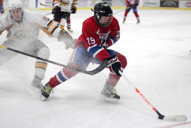 St. Paul Canadiens affiliate player Andre Kuznetson stops with the puck on his stick during the Habs&#8217; 7-3 loss to the Vermilion Tigers at Clancy Richard Arena on Friday.