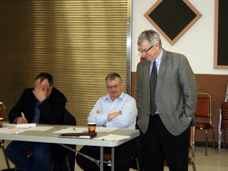 Minister of Environment and Sustainable Resource Development Robin Campbell (right) addresses the Lac La Biche-St. Paul-Two Hills PC Association, at their AGM on Feb. 9.