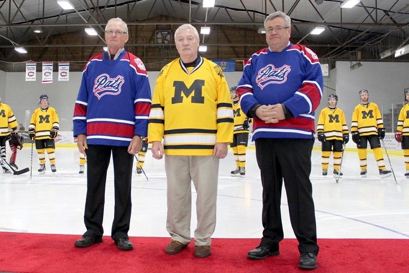 (From left) Pierre Dechaine, Wilf Martin and Guy deMoissac had their names retired to the rafters at Clancy Richard Arena to kick off Saturday&#8217;s Xtreme Hockey Night in
