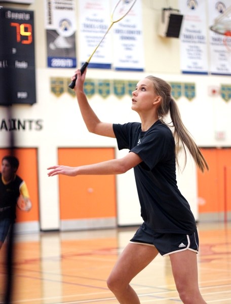 St. Paul Regional&#8217;s Marissa Muench awaits a returning shot during the junior mixed doubles event at the SPAA badminton championships last Wednesday. Muench and her