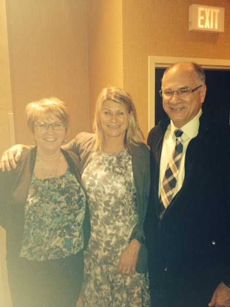 Former école Mallaig student Esther Medema-Sieben (centre) and former école Mallaig coach Ian MacGillivray (right) stand with MacGillivray&#8217;s wife Cathy following their