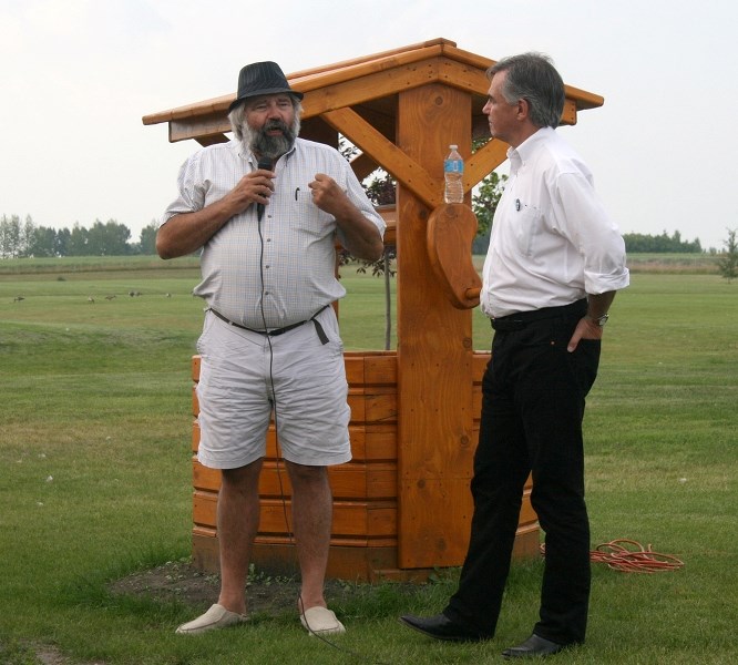PC leaedrship candidate Jim Prentice addresses guests at a talk he gave, at Reunion Station, on Aug. 1.