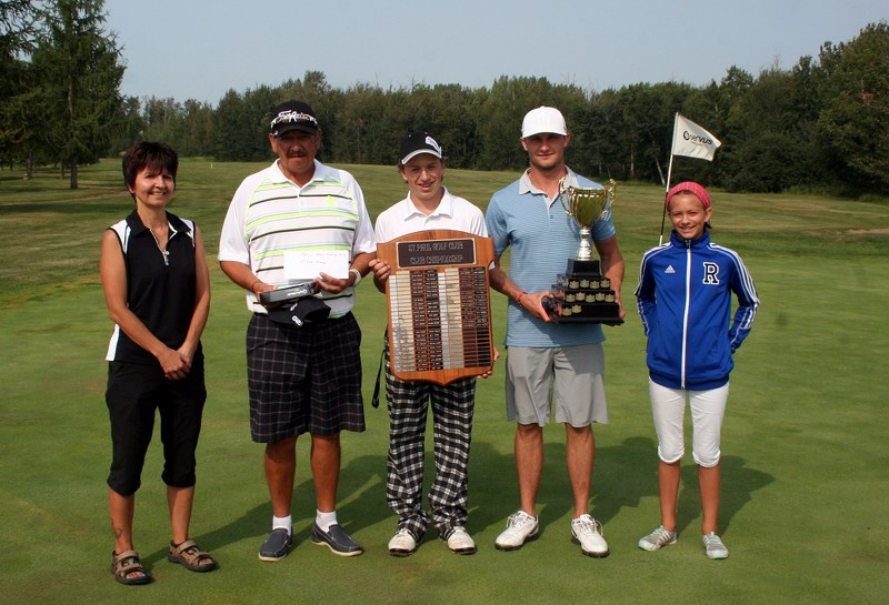 Champions Claire Desaulniers, Jeremie Pasitney, Jamie Sadlowski, and Sophie Pasitney display their awards after the club tournament held on Aug 17., at the St. Paul Golf Club.