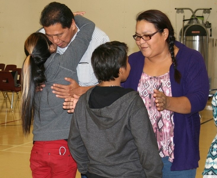 As part of a gathering meant to raise awareness and prevent suicide, participants engaged in an activity where they approached one another and talked about what they liked