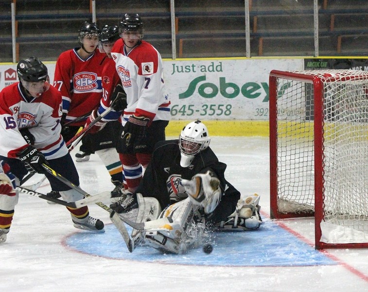 Tristan Buchta (#15) tries to put one past the goalie during an inter-squad scrimmage on Sept. 21.