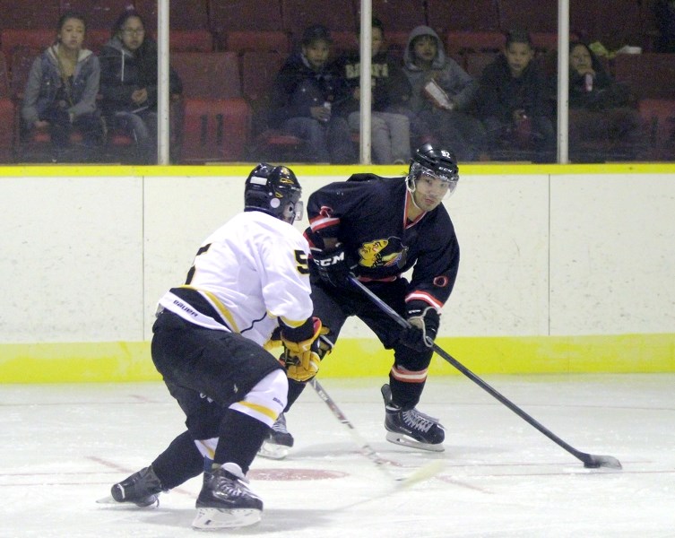 The Warriors&#8217; Brandon Cantre looks to set up some offence versus Onion Lake.