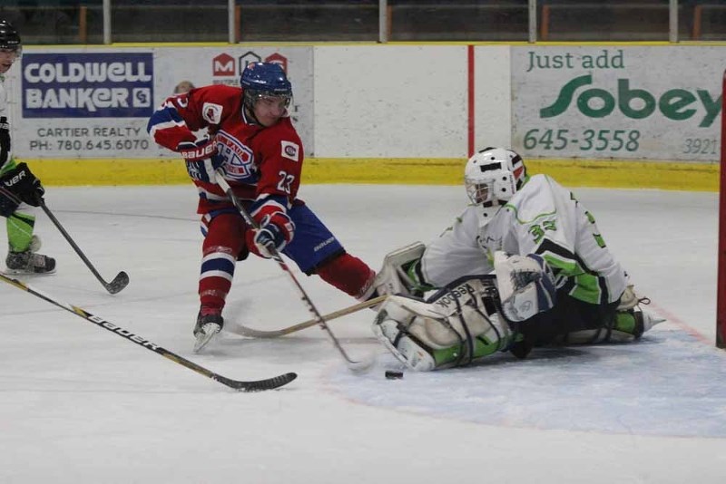 Mikael Beaudoin tries to take it to the backhand on a breakaway versus Frog Lake on Nov. 9.