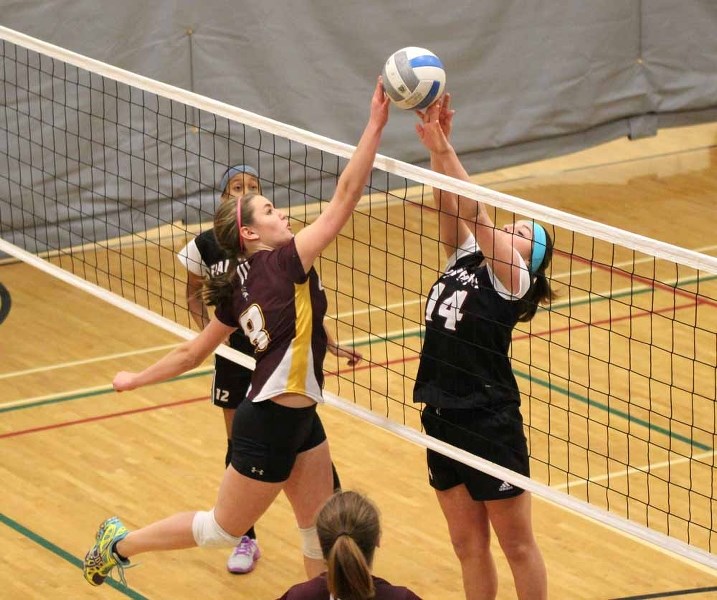 FG Miller&#8217;s Abby Baker plays the ball above the net during the Jr. SPAA tournament.