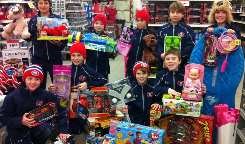 The Atom hockey team helped pick out a number of toys for the Santa&#8217;s Elves program.