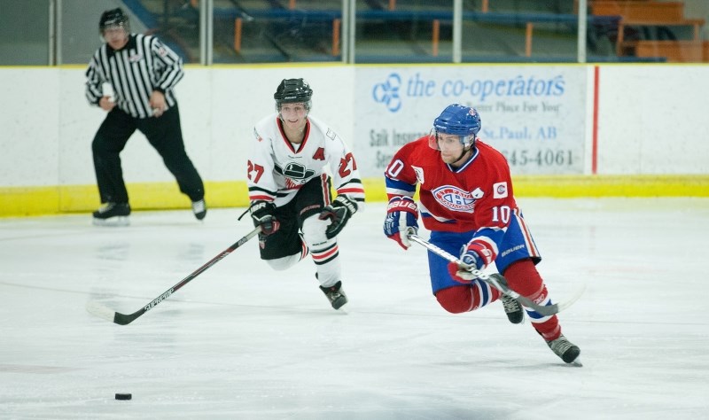 Canadiens&#8217; player Pierre-Andre Beaudoin races for the puck during last week&#8217;s first NEAJBHl playoff game between the Canadiens and the Lloydminster Bandits. The