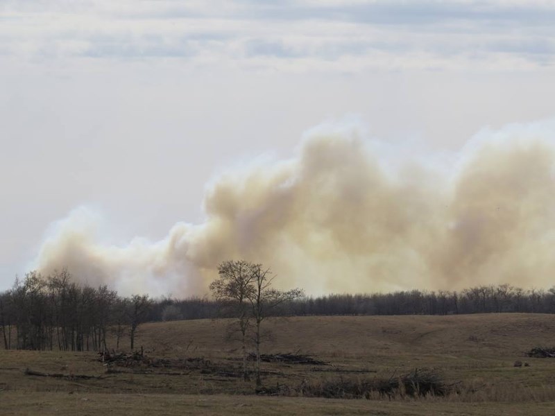 The smoke from the St. Paul grazing reserve fire can be seen here billowing in the distance. The fire affected more than 3,000 acres of land.