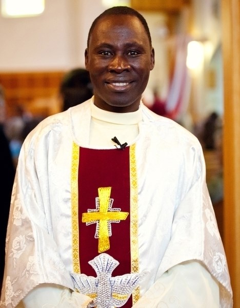 Father Gilbert Dasna is seen here a few months before his death, presiding at a wedding.