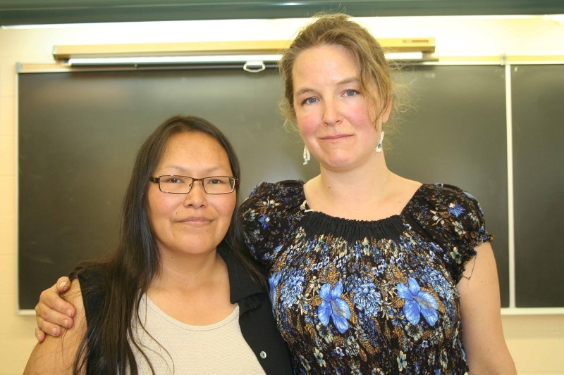 Marilyn Brighteyes and Sarah Salter Kelly took part in a healing circle on May 26, during Blue Quills&#8217; annual cultural camp.