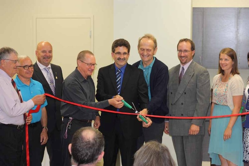 (starting left) Town of St. Paul CAO Ron Boisvert, Danny Dembicki of Vital Air, MLA David Hanson, Dr. Albert Harmse, Mayor Glenn Andersen, Dr. Harvey Woytiuk, Robb Foote of