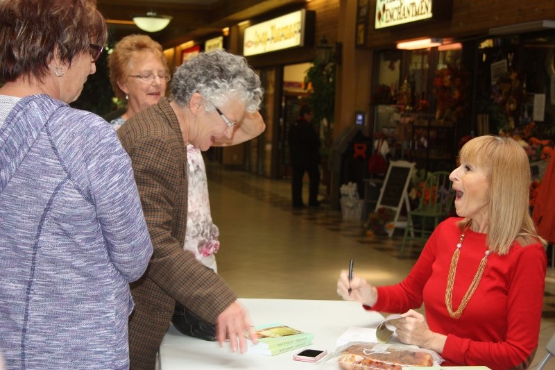 Sharon Mallon, who worked as a broadcaster with CFCW before her recent retirement, had a busy book-signing in St. Paul last Friday, as people came to visit and chat about