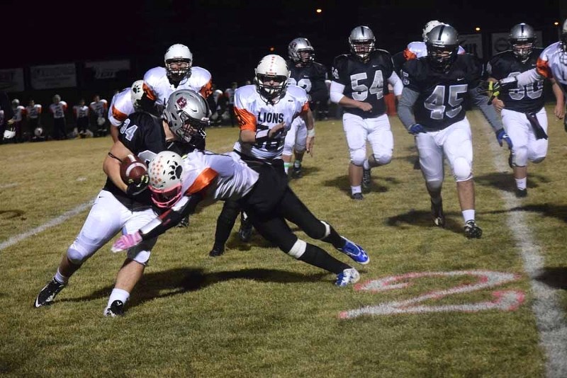 Simon Chamberland delivers a strong tackle on the Raiders&#8217; ace rusher Quinn McPherson.