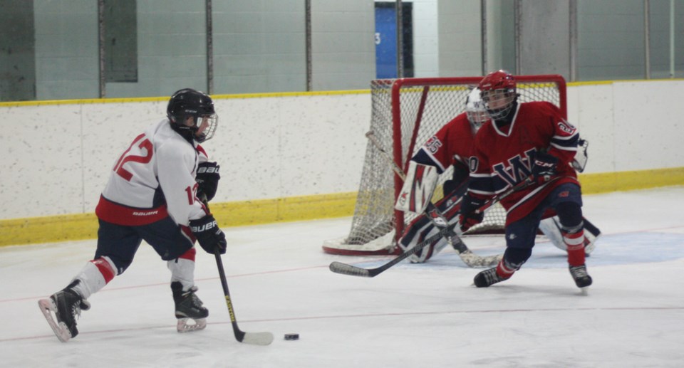 The Lakeland Panthers&#8217; Nic Beaudoin goes up against the Wetaskiwin Lions&#8217; defense in the second period of the peewee AA game, held in St. Paul last Saturday. The