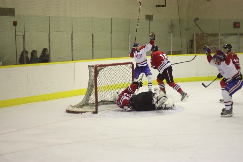 Despite the efforts of goalie Mike Newberger, Darrell Stranger scored four goals for the Canadiens in the team&#8217;s Saturday night matchup against the Warriors. Here he