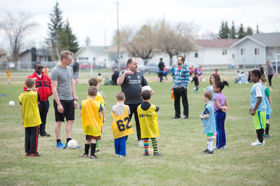 On Saturday afternoon, a large group of young soccer players took to the field near Raccette Jr. High School where they helped coaches learn about new drills and methods of