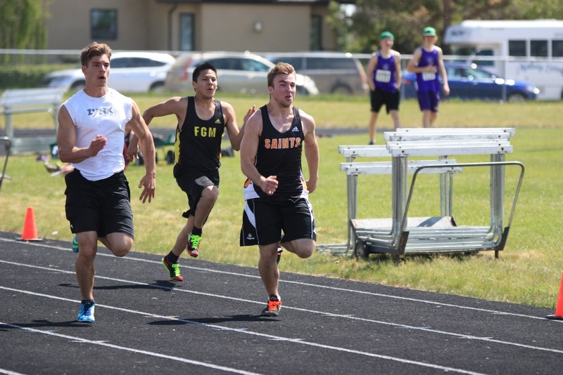 Liam Krys was one of the St. Paul Regional Saints that brought their efforts to the home track field last week for the zones competition, in which the school captured the 3A