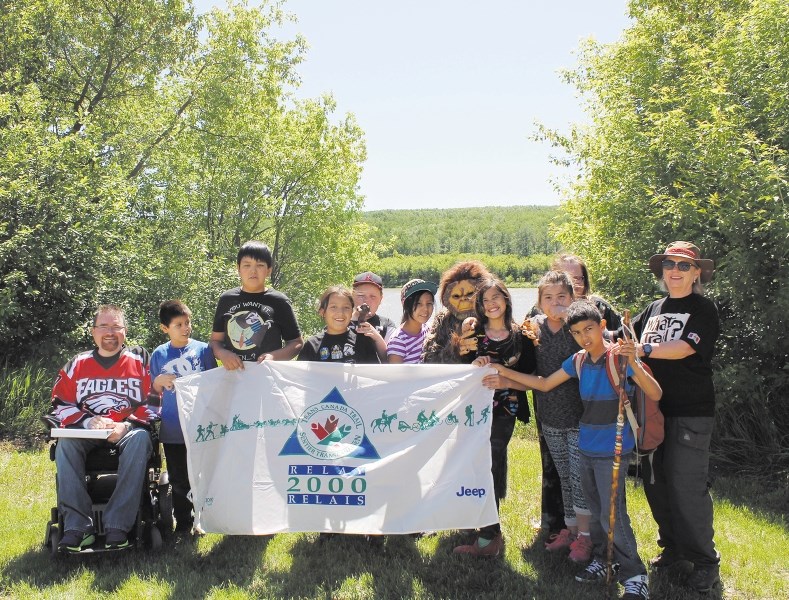 Daniel Peterson&#8217;s Grade 4 class and two Sasquatches join Sheila Thompson to wish her well on her summer adventure, travelling the Trans Canada Trail. The students