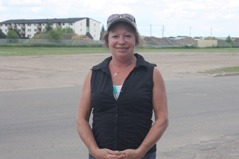 Barb McPherson is one of many who would like to see affordable housing in St. Paul. Here, she stands across from SPAN&#8217;s proposed site, along 53 ave.