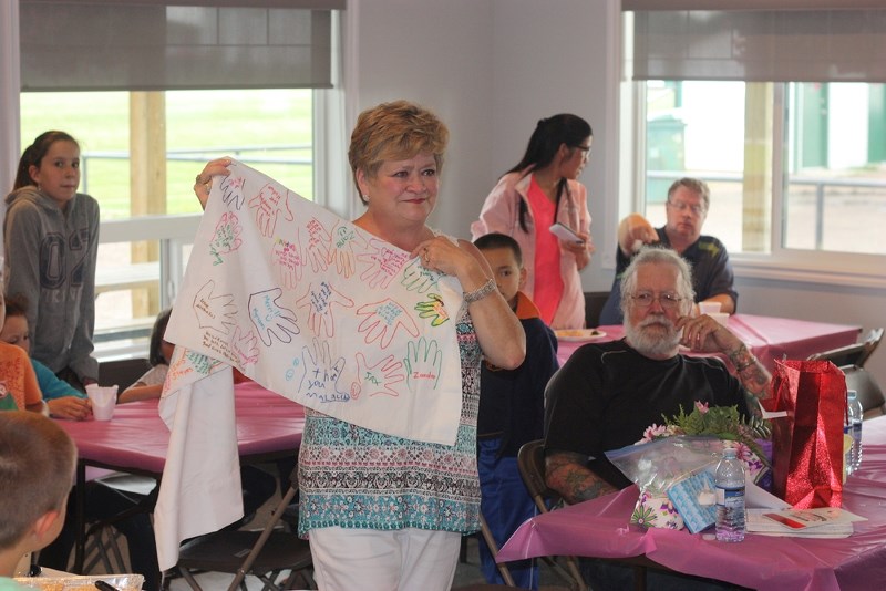 A special gathering was held on July 7 in honour of Parent Link programmer Sheila Parks, who was presented with gifts and flowers at the party.