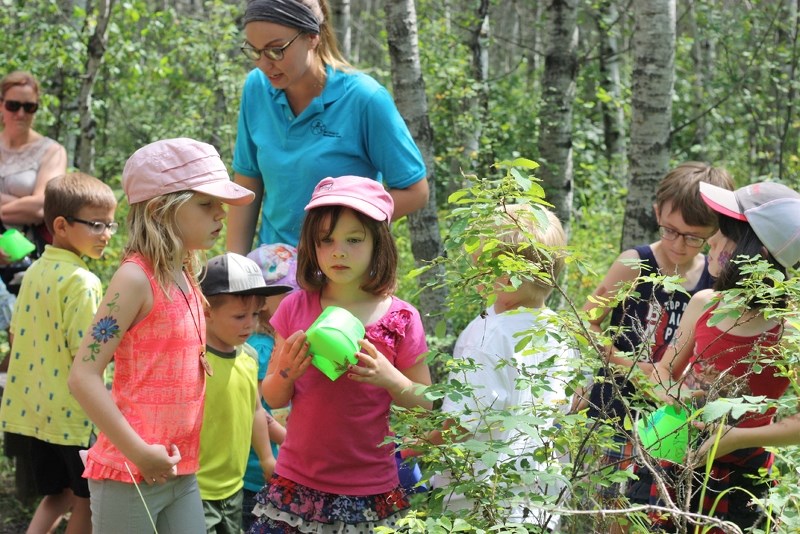 Audrey Fleming (centre) was among the children visiting the Fort George and Buckingham House historical site on Saturday that took part in a hunt for treasure. The treasure