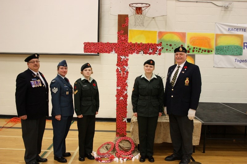St. Paul Legion&#8217;s Jim Blair, Cold Lake Air Force St. Marie-France Provost, Cadet Tedi Purvis, Cadet Emma Purvis, and the Legion&#8217;s Bill Blower stand next to a