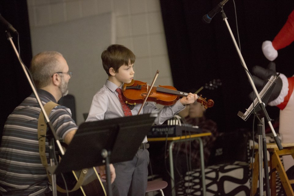 Logan Laramee performs at North Eastern Music Association&#8217;s December Christmas concert, held on Sunday at Glen Avon School. Several of the students in vocal, guitar and 