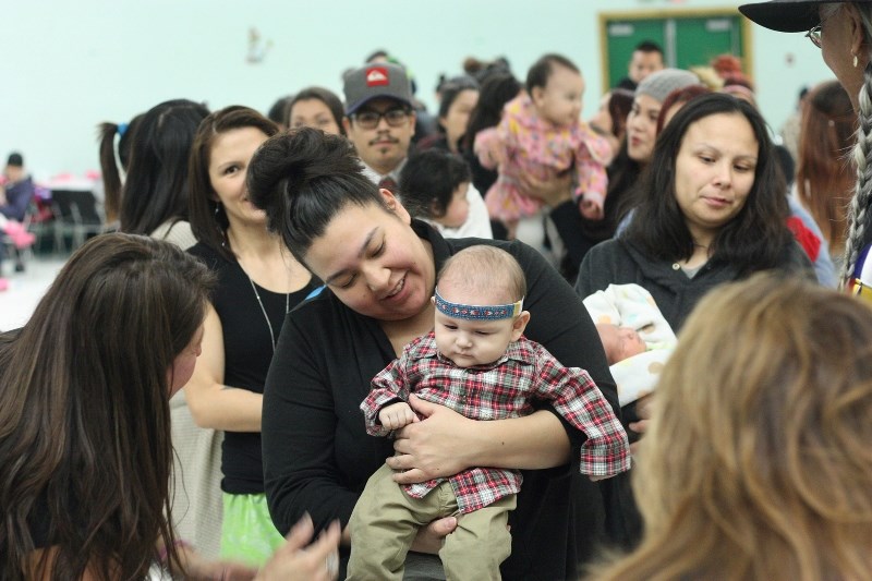 Krista Makokis and her son Wayne Shirt Jr. were among the people attending Saddle Lake&#8217;s annual baby celebration, held last Wednesday at the Ayiwakes Cultural Centre.